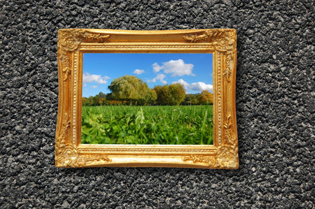 summer painting or picture in image frame on a wall
