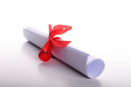 diploma isolated on a white background with copyspace for text messageの写真素材