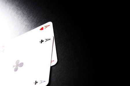 winning concept with four aces on black backgroundの写真素材