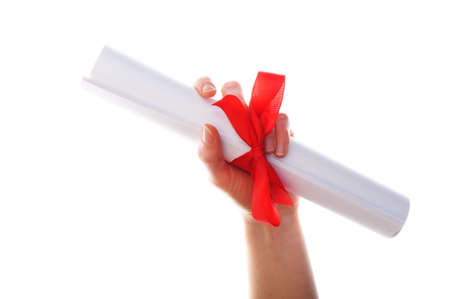 diploma graduation showing university education concept on white backgroundの写真素材