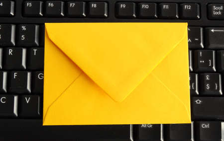 email concept with envelop computer keyboard and copyspaceの写真素材