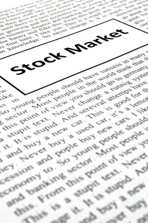 stock market concept with newspaper showing business and financeの写真素材