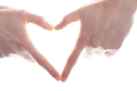 hand and heart isolated on white background showing love conceptの写真素材