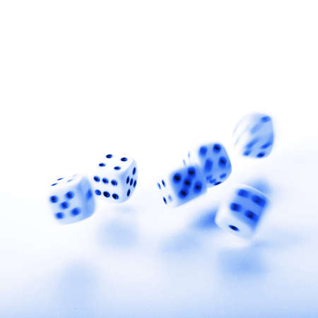 falling dice showing random fortune or casino conceptの写真素材