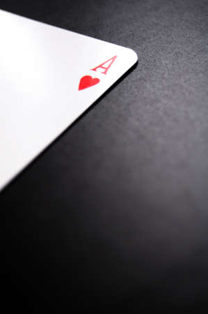 card game with aces on black backgroundの写真素材
