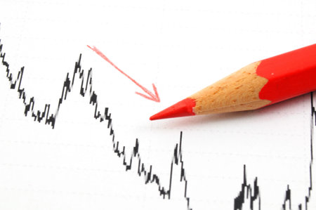 negative business data or chart showing financial crisis with red pen