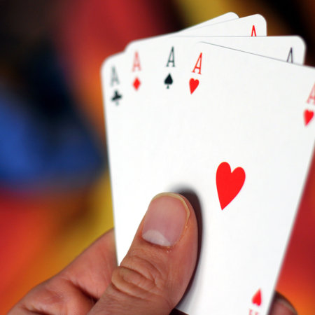four aces and bokeh copyspace for your text message