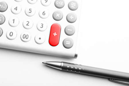 accounting concept with calculator and pen in business officeの写真素材