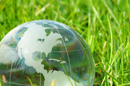eco ecology or environmental concept with green grass globe and copyspaceの写真素材