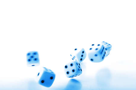 throwing dices in blue showing gambling or winning conceptの写真素材