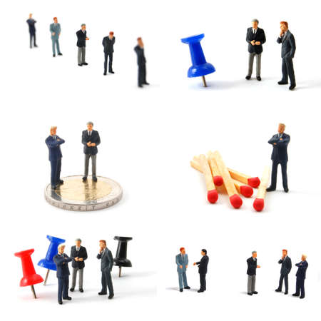 tiny toy business man collection isolated on a white backgroundの写真素材