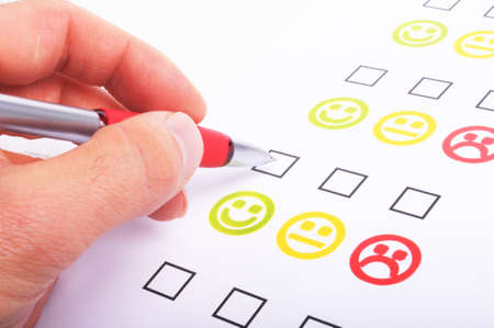 marketing interview with checkbox or tickbox and smilieの写真素材