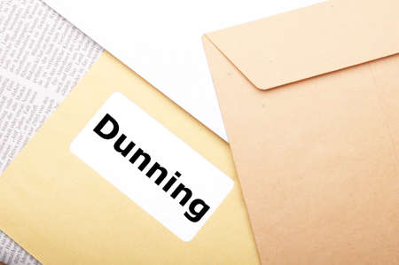 dunning or reminder concept with post letter and wordの写真素材