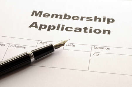 membership application form on desktop in business officeの写真素材