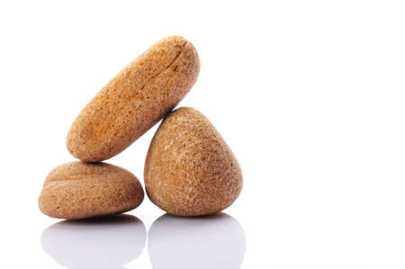 zen stones or spa still life isolated on white showing harmony with copyspaceの写真素材