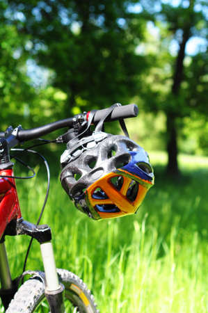 mountain bike with helmet showing safety or sports concept in natureの写真素材