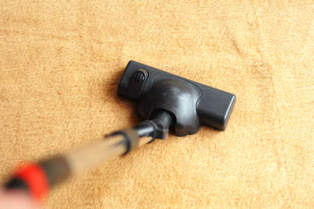 vacuum cleaner and copyspace showing housework or domestic life conceptの写真素材