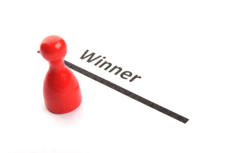 business success or winner concept with pawns on whiteの写真素材