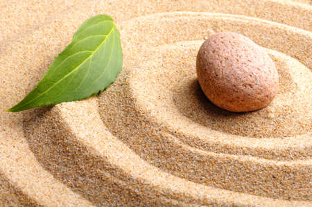zen garden or spa still life with stone pebble and sandの写真素材