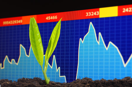 growth or growing economy concept with business chart and young plant