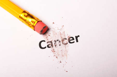 cancer and eraser showing health or medical conceptの写真素材