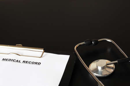 medical record clipboard and stethoscope showing health or medicine conceptの写真素材