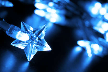 xmas or christmas holiday star lights with copyspaceの写真素材