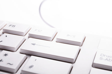 modern computer keyboard on white showing pc or technology conceptの写真素材