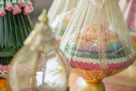 Thai dessert in fabric cover on tray. Prepare to engagement or wedding ceremony. Select focus.の写真素材