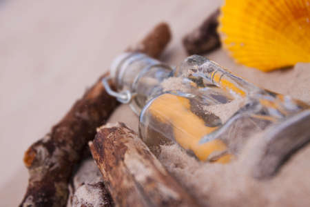 Beach compositions. Botlle brought by the waterの写真素材