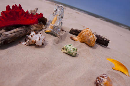 Beach compositions. Botlle brought by the waterの写真素材
