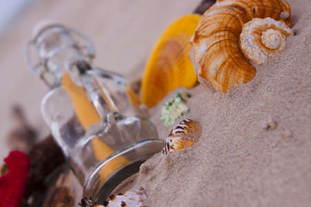 Beach compositions. Botlle brought by the waterの写真素材