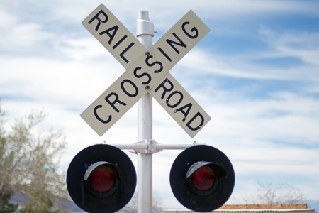 Vintage Rail Road Crossing Sign with red lightsの写真素材