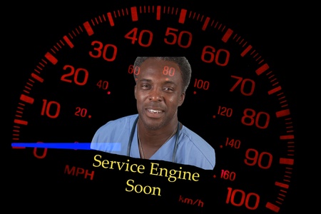 red speedometer on black background with mechanic, warning about service engine lightの写真素材