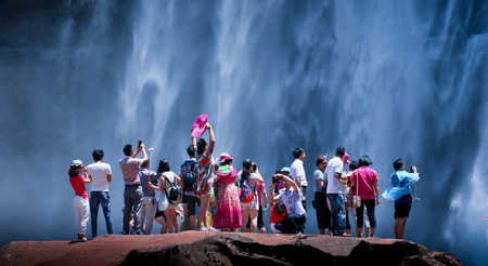 The men and women under the waterfallのeditorial素材