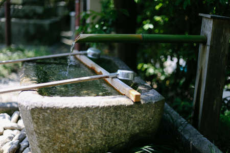 Water flowing from the bambooの写真素材