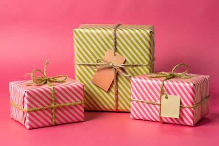 The image presents neatly wrapped gifts of varying sizesの写真素材