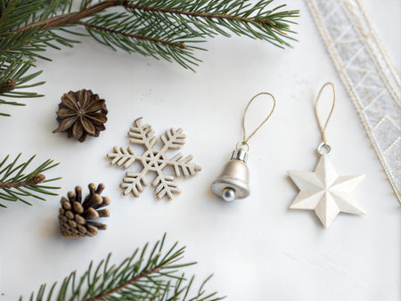 Simple Christmas ornaments arranged on a white background. Pastel color scheme.の写真素材
