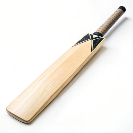 A new cricket bat, made of wood, with a black and white design. The bat is on a white background.の写真素材