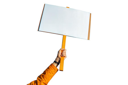 Close-up of a hand holding a blank sign, isolated on a black background.  Perfect for adding your own text or message.の写真素材