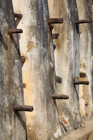 Mud and stick mosque wall closeup, in Nakori, Ghanaの写真素材