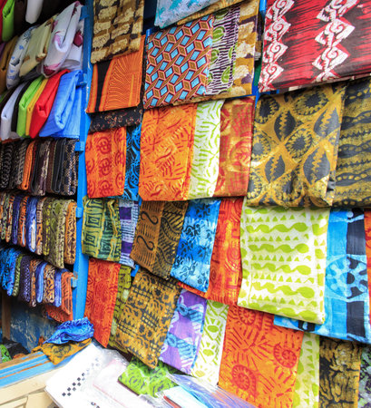 Bright cloth for sale at the market in Kumasi, Ghana
