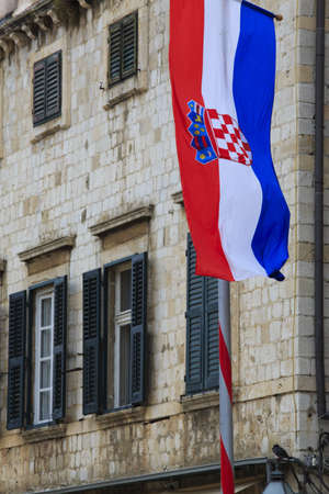Typical Dubrovnik house with Croatian flagの写真素材