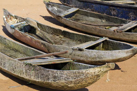 Old dugout canoes on the beach in Axim, Ghanaの写真素材