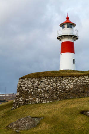 Skansin lighthouse with grassy wall in Torshavn Faroe Islandsの写真素材