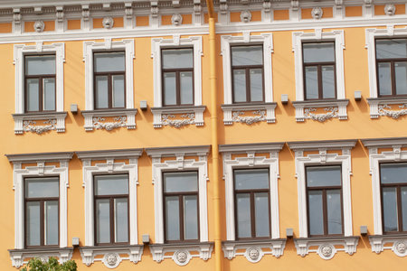 Several windows with beautiful moldings in a historic building