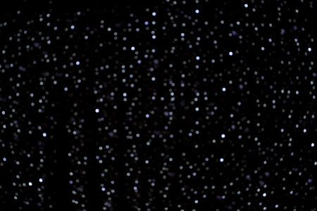 abstract dark background with light bokeh like stars
