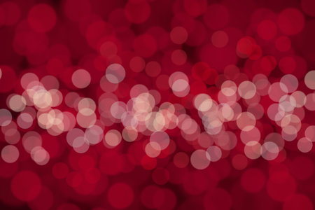 Abstract background of a blurred burgundy-red bokeh