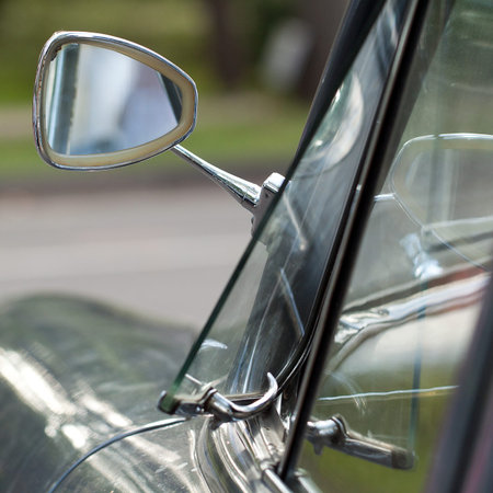 vintage car with funny triangular rear view mirror