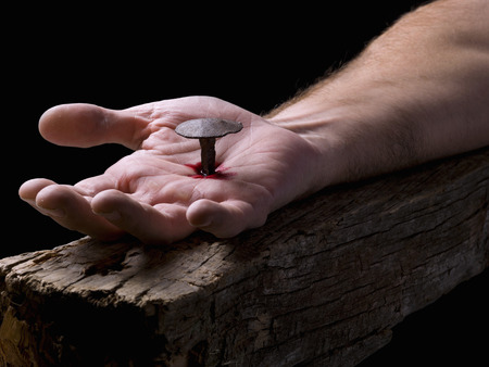 Hand of Christ, nailed to the crossの写真素材